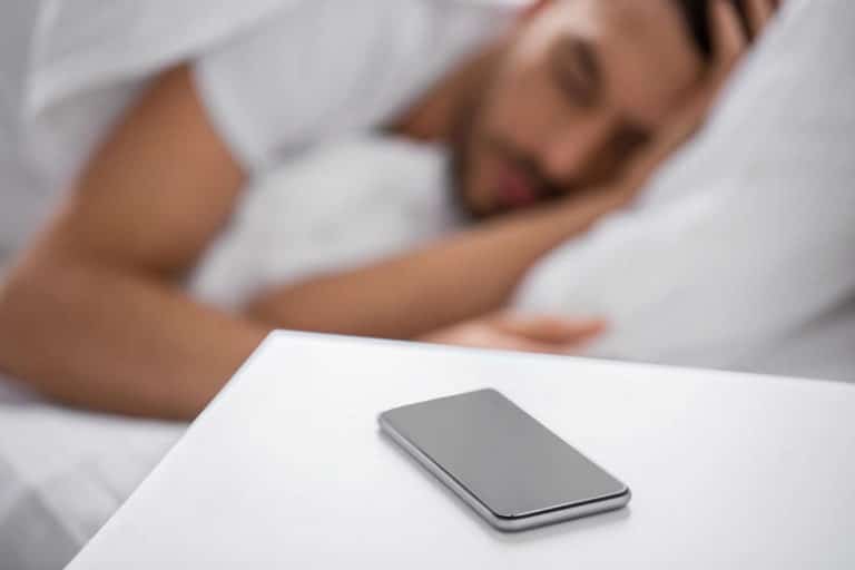 How far away should your cell phone be when you sleep